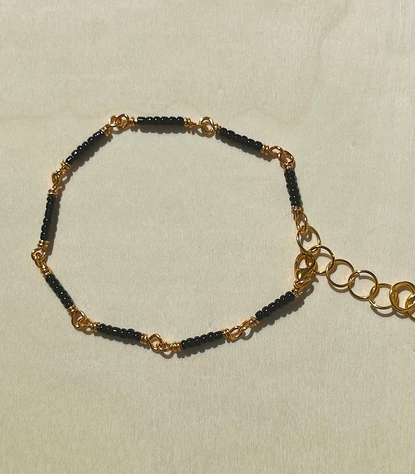 Black and gold seed beaded bracelet/anklet